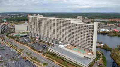 an aerial view of a large building next to a river at Bikini Bottom at Laketown Wharf #501 by Nautical Properties in Panama City Beach