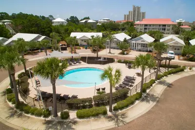 an overhead view of a swimming pool at a resort at Sunset Shenanigans - Easy walk to the beach easy bike ride to Seaside in Santa Rosa Beach