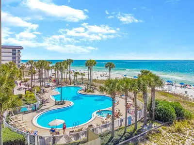a view of the pool at the resort with the beach at Grand Panama #1-2101 in Panama City Beach