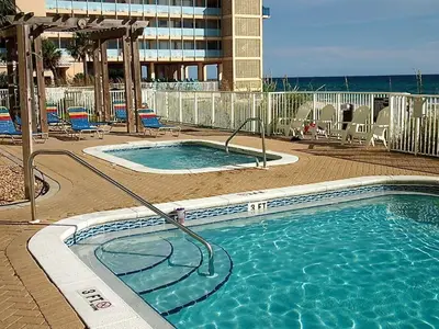 a large swimming pool in a resort with at Ocean Reef 703 in Panama City Beach