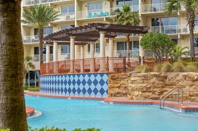 a swimming pool in front of a hotel at Shores Of Panama #2101 in Panama City Beach