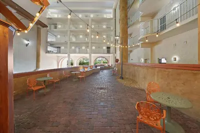 a room with tables and chairs in a building at Shores Of Panama #2101 in Panama City Beach