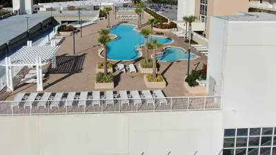 an overhead view of a swimming pool on a building at Nautical Nest at Laketown Wharf #1019 by Nautical Properties in Panama City Beach