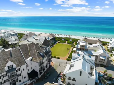 an aerial view of the beach with houses and the ocean at Somerset Cottage by 30A Escapes in Rosemary Beach
