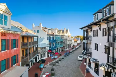 an empty street in a town with buildings at The Pointe Unit 121 by 30A Escapes in Rosemary Beach