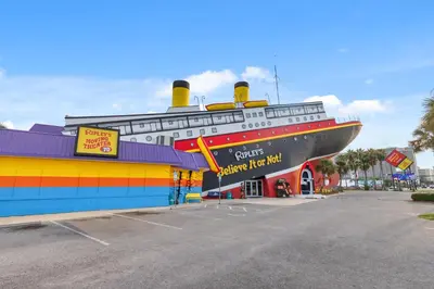 a large cruise ship parked in a parking lot at Watercrest 1704 - Serenity Shores in Panama City Beach