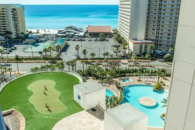 an aerial view of a pool at a resort at Laketown Wharf 1829 by Emerald Coast Retreats in Panama City Beach