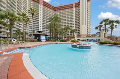 a large swimming pool in front of a large building at Shores Of Panama #1509 in Panama City Beach