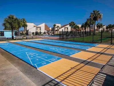 a swimming pool with a blue and yellow at Horizon South 83d in Panama City Beach