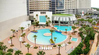 an overhead view of a pool at a hotel at Laketown Wharf #1411 by Nautical Properties in Panama City Beach