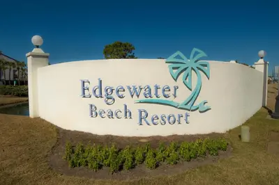 a sign for a beach resort at Edgewater Villa 3001 'Vitamin Sea' in Panama City Beach