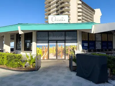 a store front of a building with a sign on it at Edgewater Villa 1101 'Sunset Paradise At Edgewater' in Panama City Beach