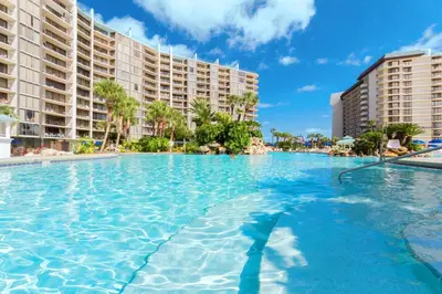 a large swimming pool in front of some buildings at Edgewater Tower 2-108-Gunners Paradise in Panama City Beach