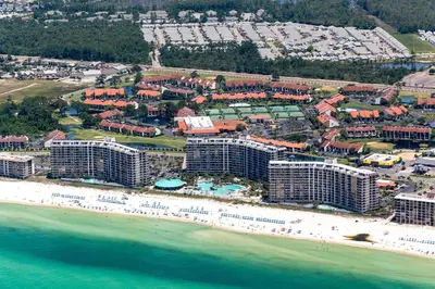 an aerial view of a beach with buildings and the ocean at Edgewater Tower 2-108-Gunners Paradise in Panama City Beach