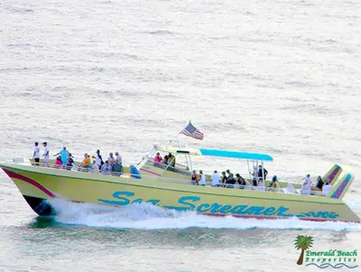 a group of people on a boat in the water at Top Of The Gulf 316 'Coastal View' in Panama City Beach