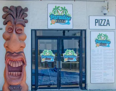 a building with a door with a face on it at Edgewater 2-0602 'Beach Blessings' in Panama City Beach