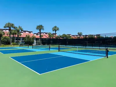 two tennis courts on a tennis court at Edgewater 2-0602 'Beach Blessings' in Panama City Beach