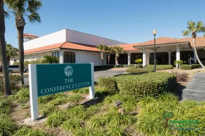 a sign in front of a building at Edgewater Villa 1303 'Gone Gulf'N' in Panama City Beach