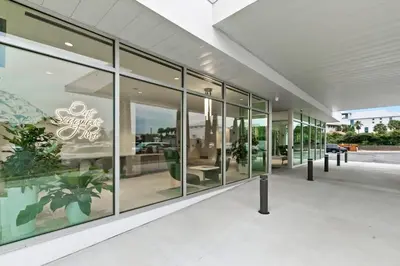 a large glass building with a lot of windows at One Seagrove Place 0401 in Santa Rosa Beach