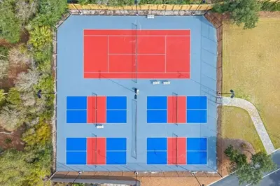 an overhead view of a parking lot with red and blue squares at High Pointe Resort 432 in Inlet Beach