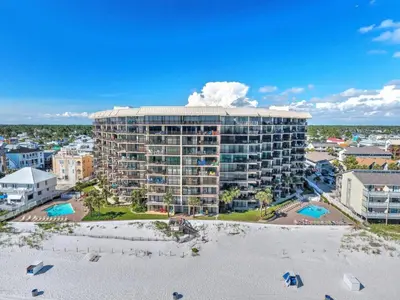 an aerial view of a large building on the beach at Pelican Walk 210 in Panama City Beach