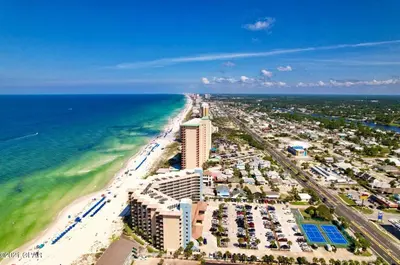 an aerial view of a beach and the ocean at Pelican Walk 104 in Panama City Beach