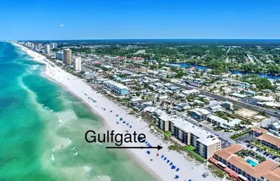an aerial view of a beach with buildings and the ocean at Gulfgate 204 in Panama City Beach
