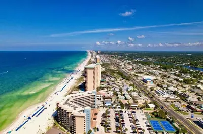 an aerial view of a beach and the ocean at Pelican Walk 510 in Panama City Beach