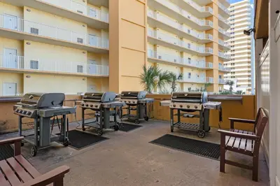 a row of bbq tables in a building at Treasure Island #0607 in Panama City Beach
