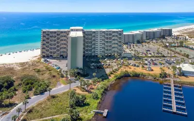 an aerial view of a resort and the beach at Ocean Breezes by Oversee 30A in Carillon Beach