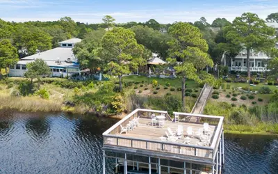 an aerial view of a dock on a lake at Casa Playa by Oversee 30A in Santa Rosa Beach