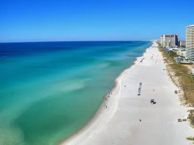 an aerial view of a beach and the ocean at Summit Beach Resort #1202 in Panama City Beach