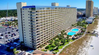 an aerial view of a large building next to a parking lot at Summit Beach Resort 1231 in Panama City Beach