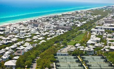 an aerial view of a city with houses and the ocean at Julia's Carriage House in Rosemary Beach