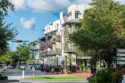 a building on a city street with a traffic light at Uncorked Carriage House in Rosemary Beach