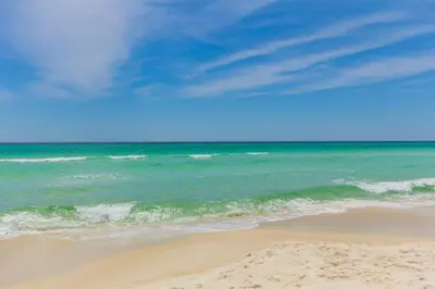 a view of a beach with the ocean at Sugar Sand Retreat – 3-Bed, 2-Bath Beach Getaway with Private Pool, Sleeps 8! in Santa Rosa Beach