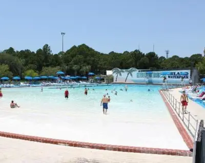 a group of people in a swimming pool at Beautiful Gulf and Lake views from Pinnacle Port A-935! in Panama City Beach