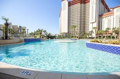 a large swimming pool in front of some buildings at Laketown Wharf #624 Beautiful Gulf View by Nautical Properties in Panama City Beach