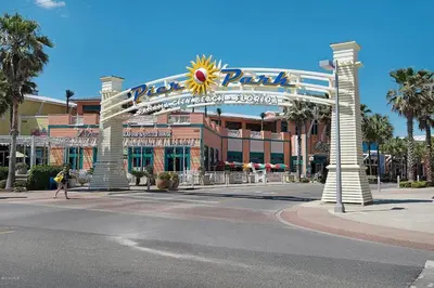 a large building with a large sign on a street at 1005 Calypso Direct Ocean Front Master on the Gulf in Panama City Beach