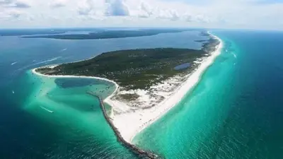an aerial view of an island in the ocean at Aqua 408 in Panama City Beach