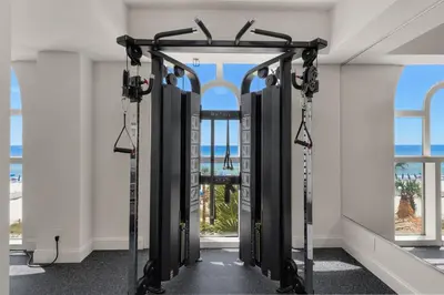 a row of treadmills in a room with windows at 204 West Calypso 2nd floor Gulf Front Specials! in Panama City Beach