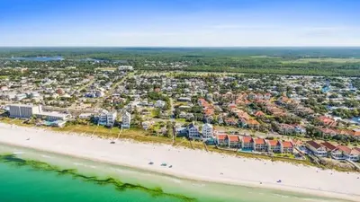 an aerial view of a beach with hotels and condos at Palm Paradise in Panama City Beach