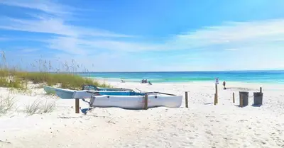 a group of boats sitting on the beach at Grand Panama 902 in Panama City Beach