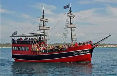 a group of people on a pirate ship in the water at Grand Panama 904 in Panama City Beach