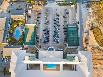 an aerial view of a parking lot with a building at Gulf Peak Retreat - Watercrest 2 BR 2 BA - Sleeps in Panama City Beach