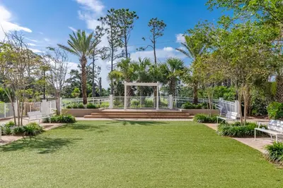 a park with benches and a gazebo at Spacious 1-Bedroom! Ocean Views & 5 Pools Resort! by Dolce Vita Getaways PCB in Panama City Beach