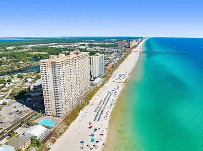 an aerial view of a beach with buildings and the ocean at Tidewater 2903 in Panama City Beach