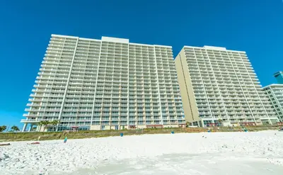 a view of a hotel from the beach with a beach at Majestic Beach Towers 2-1801 in Panama City Beach