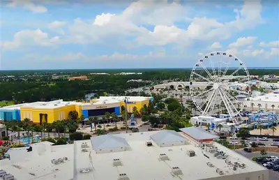 an aerial view of a amusement park with a ferris wheel at Ocean Bliss by Emerald Coast Retreats in Panama City Beach
