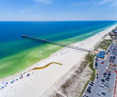an aerial view of a beach with a pier at Origin 0623 - Studio King- Amazing Value - City View by Beach Haven Vacation Rentals in Panama City Beach